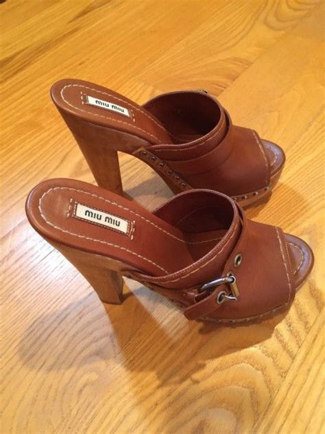 miu miu brown leather buckle wooden platform sandals mules